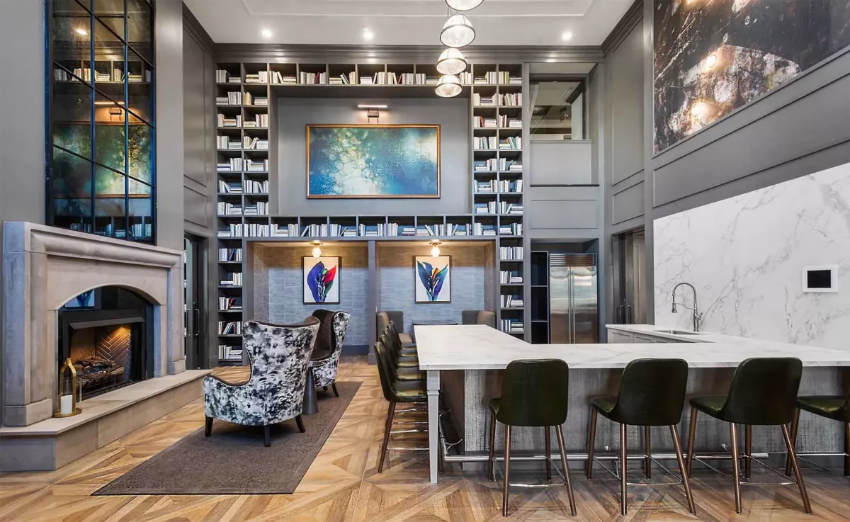 Resident Lounge featuring a Display Kitchen with counter and bar seating