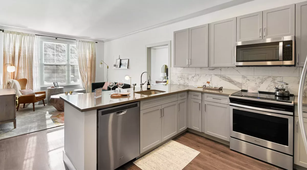 Kitchen and living room at Carraway apartments in Harrison, New York