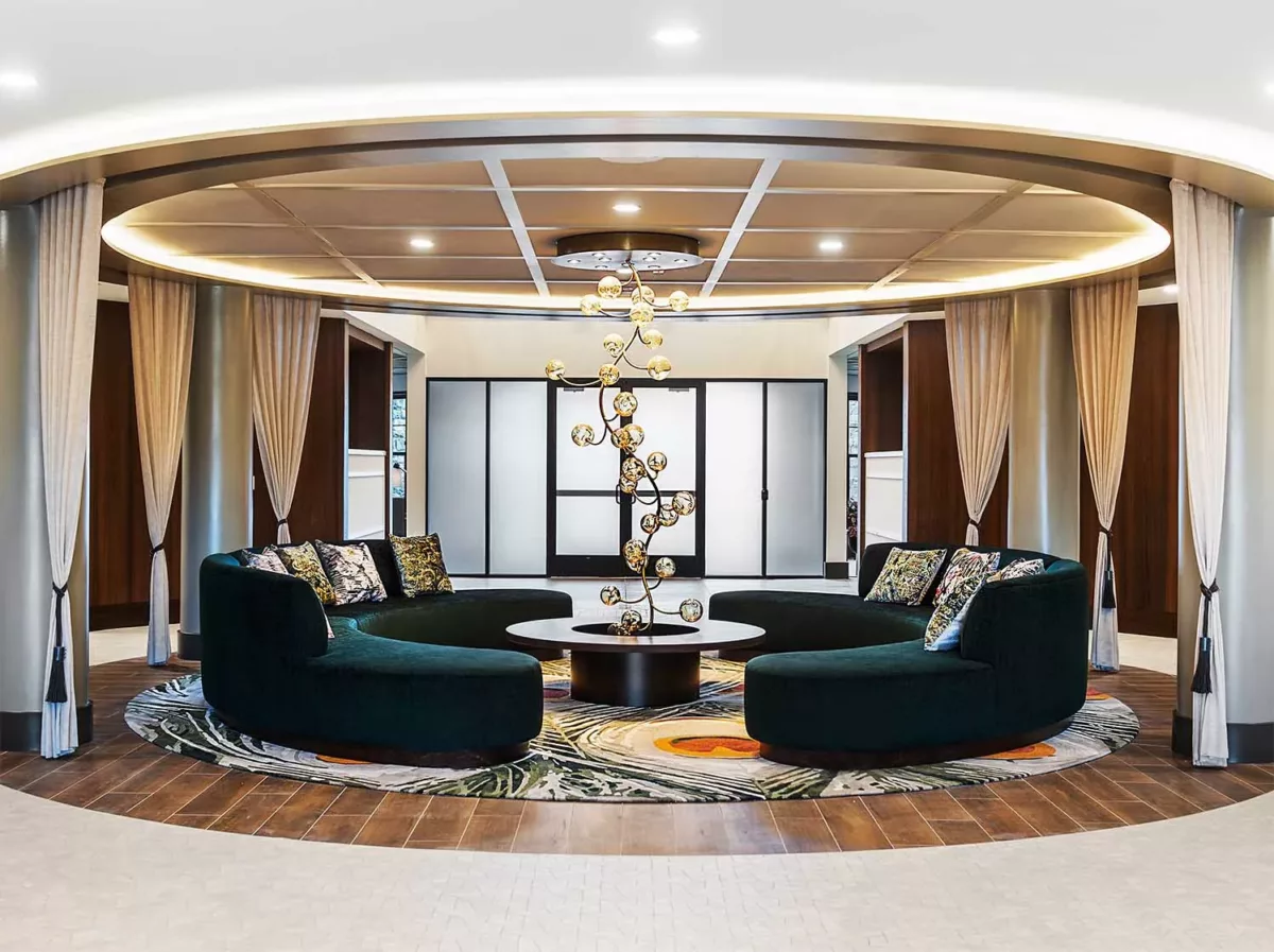 Light-filled lobby at Carraway featuring a grand entry and artwork