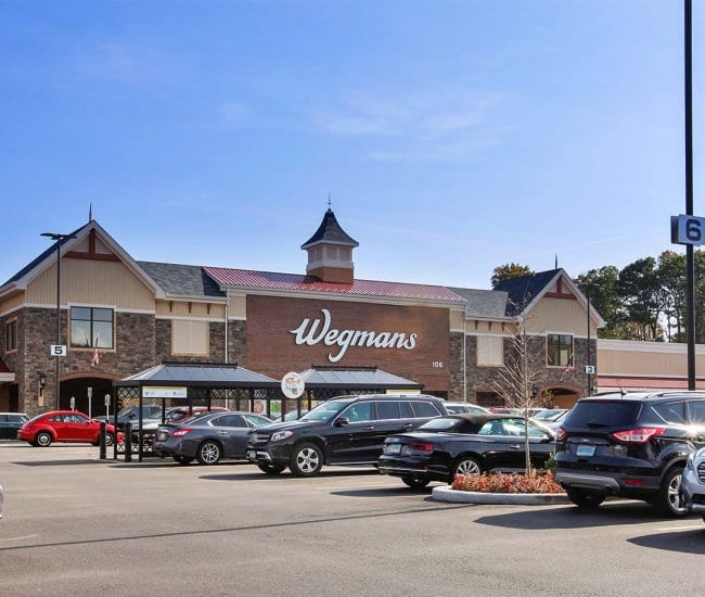 Wegman's flagship store is a two-minute walk down the road from Carraway luxury apartment homes.