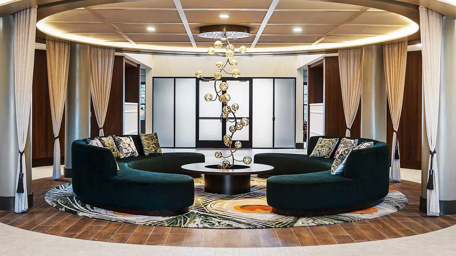 Light-filled lobby at Carraway featuring a grand entry and artwork