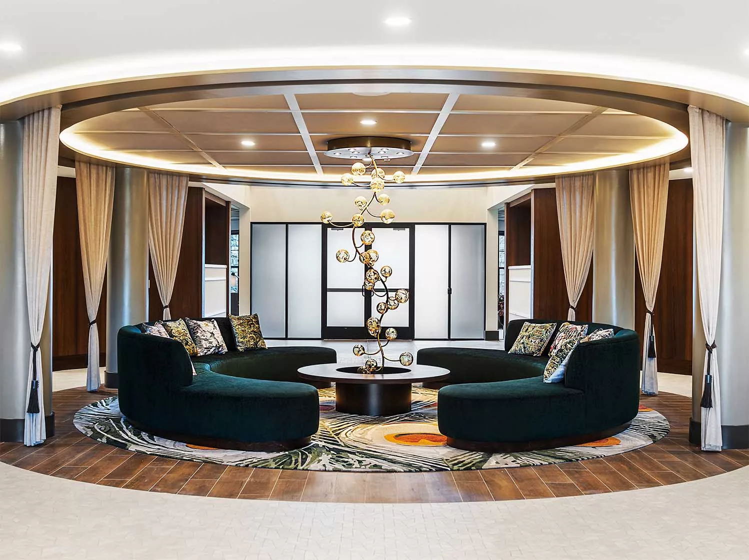 Light-filled lobby at Carraway featuring a grand entry and artwork